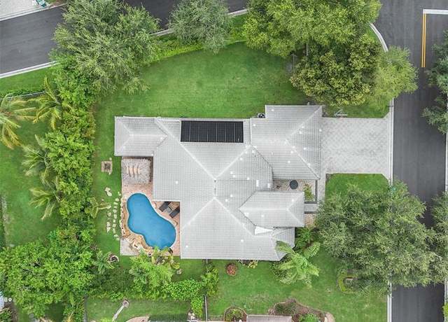 Property at 10668 NW 69th St, Parkland, FL 33076, 5 beds, 3 baths