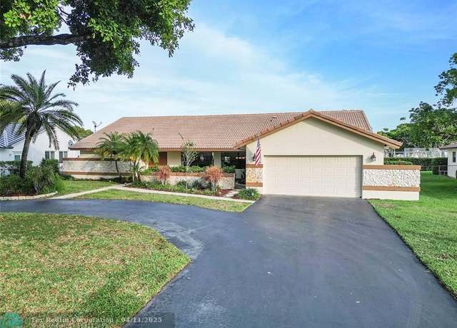Property at 9950 NW 11th Mnr, Coral Springs, FL 33071, 4 beds, 2.5 baths
