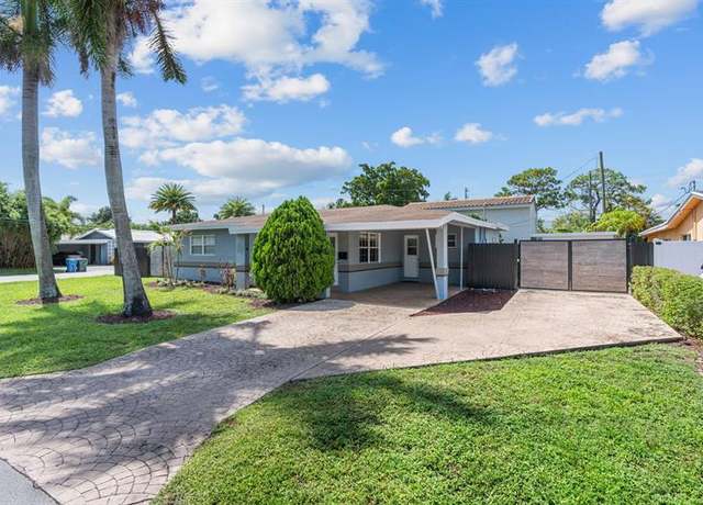 Property at 1498 NE 39th St, Oakland Park, FL 33334, 4 beds, 3 baths