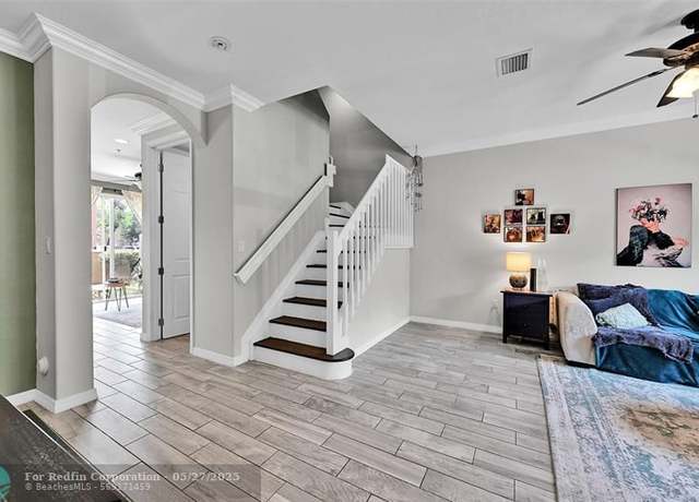 Property at 2851 W Prospect Rd #1202, Tamarac, FL 33309, 3 beds, 2.5 baths