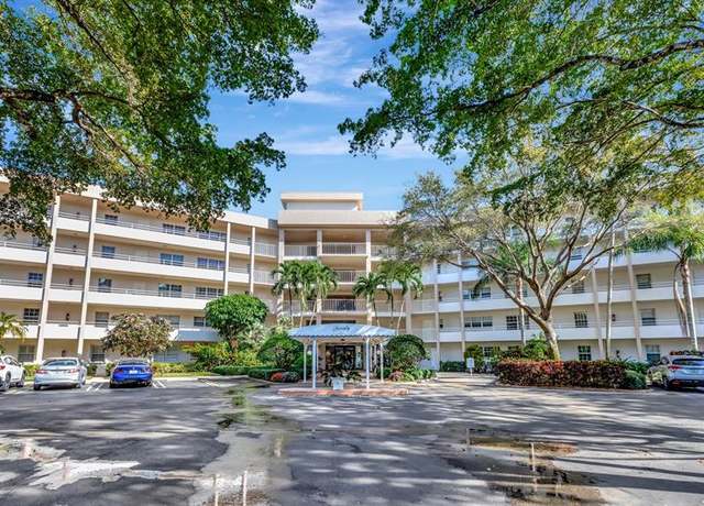 Property at 3800 Oaks Clubhouse Dr #402, Pompano Beach, FL 33069, 2 beds, 2 baths