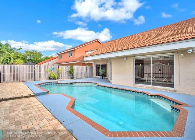 Property at 9520 NW 18th Dr, Plantation, FL 33322, 3 beds, 2 baths