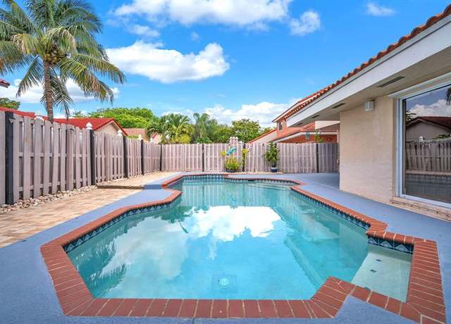 Property at 9520 NW 18th Dr, Plantation, FL 33322, 3 beds, 2 baths