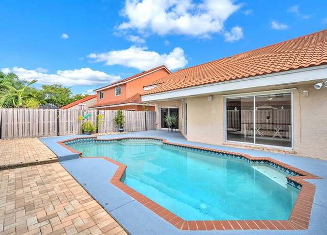 Property at 9520 NW 18th Dr, Plantation, FL 33322, 3 beds, 2 baths