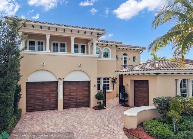 Property at 12334 NW 80th Pl, Parkland, FL 33076, 5 beds, 3 baths