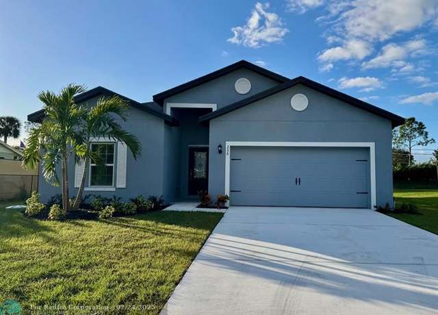 Property at 256 SW Grove Ave, Port St. Lucie, FL 34983, 5 beds, 3 baths
