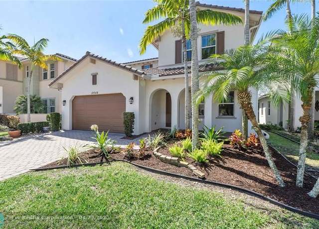 Property at 12068 NW 83rd Pl, Parkland, FL 33076, 4 beds, 3 baths