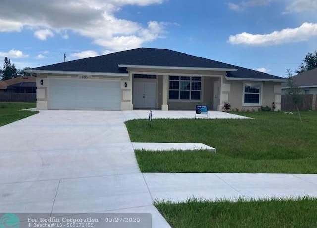 Property at 1661 SW California Blvd, Port St. Lucie, FL 34953, 4 beds, 3.5 baths