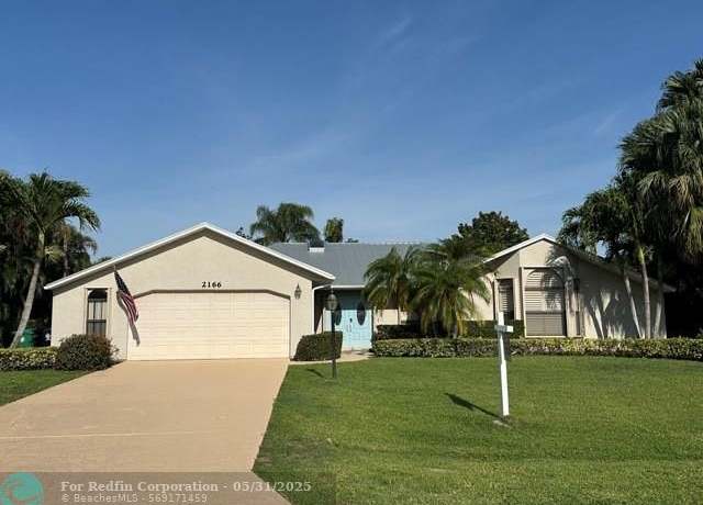 Property at 2166 SE Bersell Rd, Port St. Lucie, FL 34952, 3 beds, 2 baths