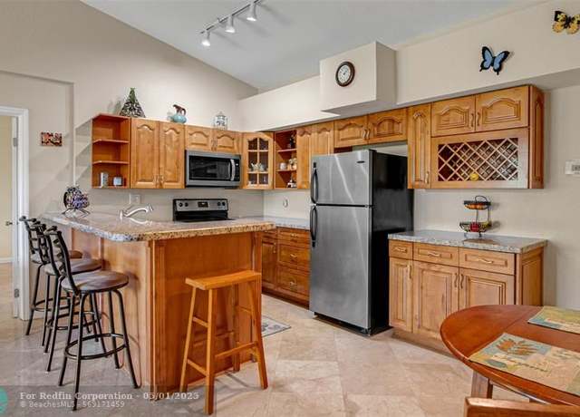 Property at 821 Lyons Rd Unit 21-204, Coconut Creek, FL 33063, 2 beds, 2 baths
