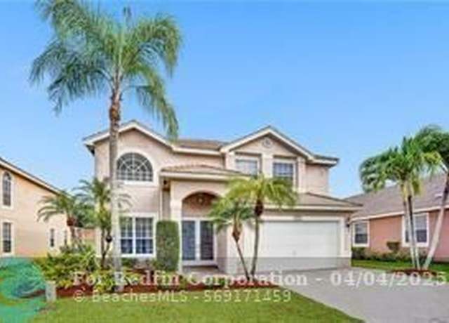 Property at 12237 Glenmore Dr, Coral Springs, FL 33071, 4 beds, 3.5 baths