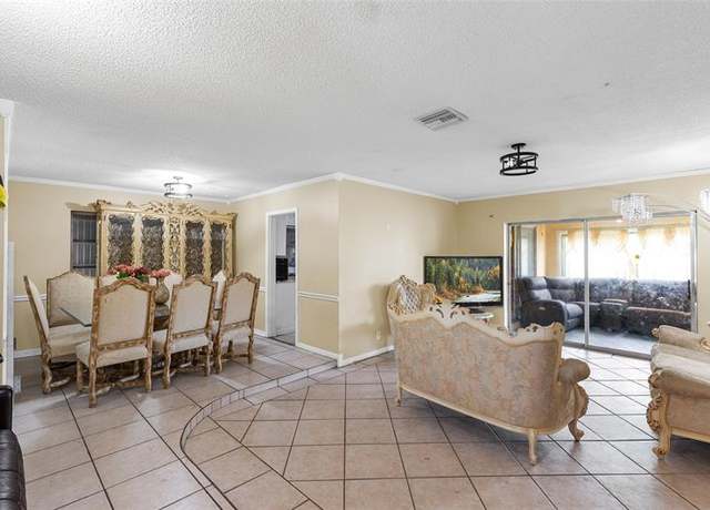 Property at 970 SW 67th Ave, North Lauderdale, FL 33068, 4 beds, 2 baths