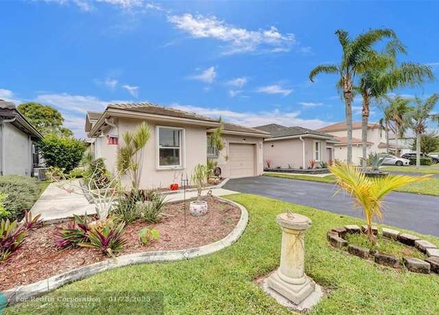 Property at 6967 NW 69th Ct, Tamarac, FL 33321, 3 beds, 2 baths