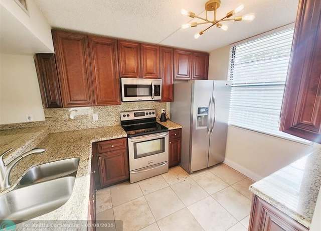 Property at 1713 Whitehall Dr #401, Davie, FL 33324, 2 beds, 2 baths