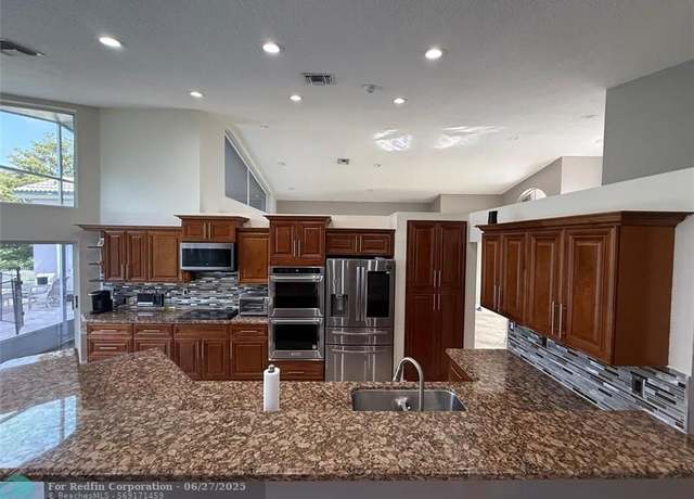 Property at 1750 NW 127th Way, Coral Springs, FL 33071, 5 beds, 3.5 baths