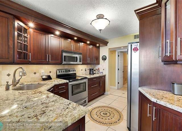 Property at 105 Lake Emerald Dr #410, Oakland Park, FL 33309, 1 bed, 1.5 baths