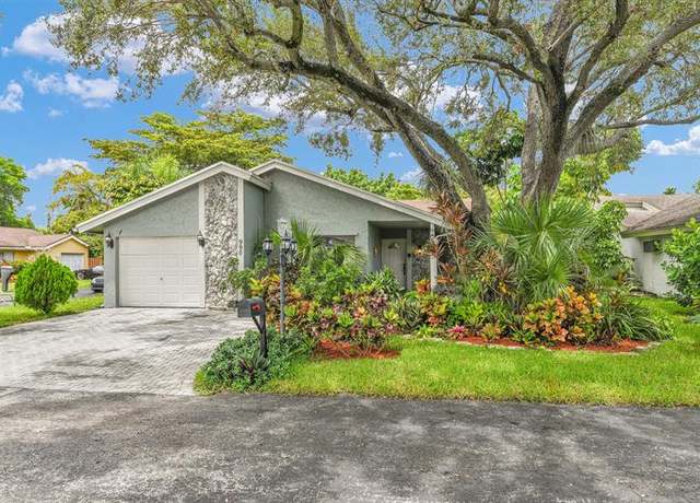 Property at 990 NW 89th Ave, Plantation, FL 33324, 3 beds, 2 baths