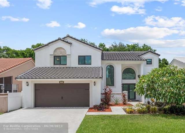 Property at 10037 Country Brook Rd, Boca Raton, FL 33428, 4 beds, 2.5 baths