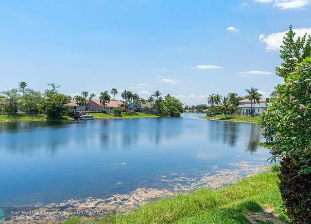 Property at 11330 Lake Shore Dr, Hollywood, FL 33026, 4 beds, 3 baths