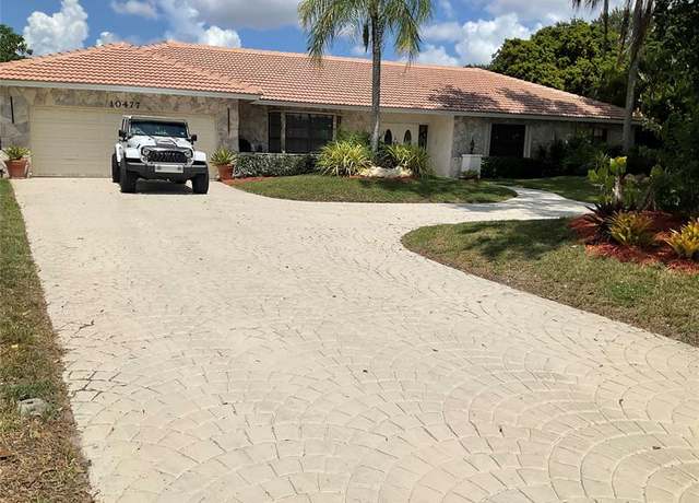 Property at 10477 NW 4th St, Coral Springs, FL 33071, 4 beds, 3.5 baths