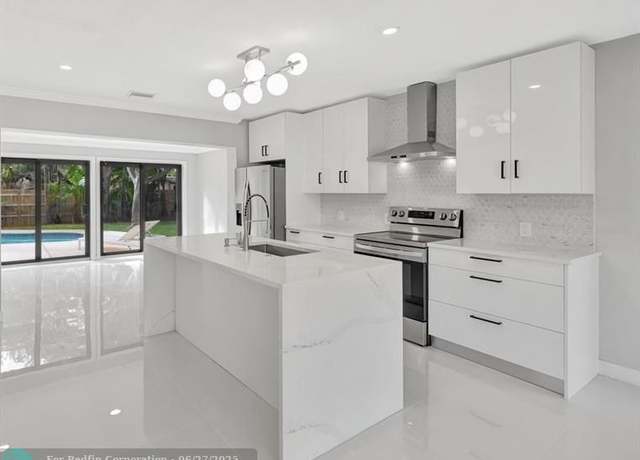 Property at 1310 NE 42nd St, Oakland Park, FL 33334, 3 beds, 2 baths