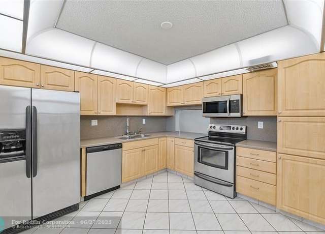Property at 4930 E Sabal Palm Blvd #402, Tamarac, FL 33319, 2 beds, 2 baths