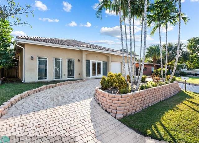 Property at 750 NW 37th St, Oakland Park, FL 33309, 4 beds, 5 baths