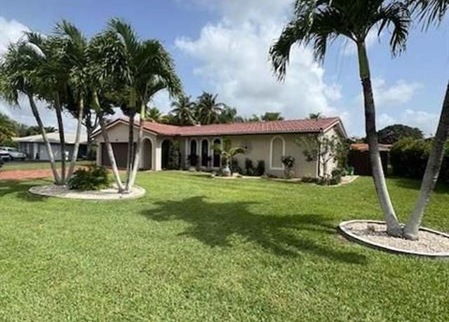 Property at 8477 NW 27th Dr, Coral Springs, FL 33065, 4 beds, 2 baths