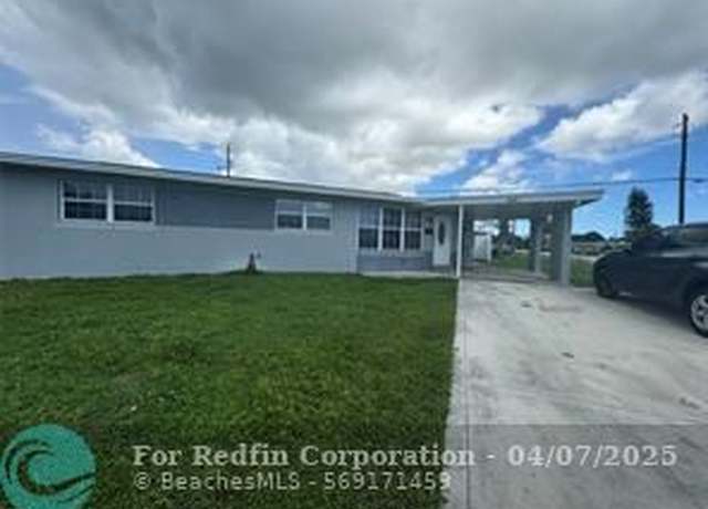 Property at 417 Los Altos Rd, Palm Springs, FL 33461, 3 beds, 2 baths