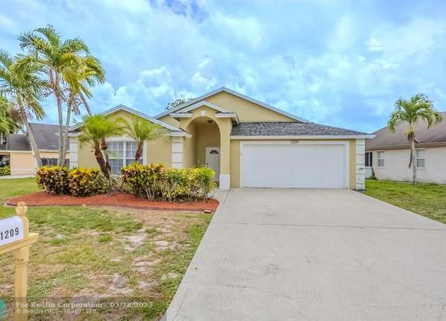 Property at 1209 Hatteras Cir, Green Acres, FL 33413, 3 beds, 2 baths