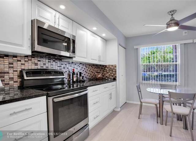 Property at 1702 Andros Isle Unit E1, Coconut Creek, FL 33066, 2 beds, 2 baths