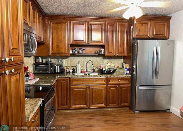 Property at 4940 E Sabal Palm Blvd #102, Tamarac, FL 33319, 2 beds, 2 baths