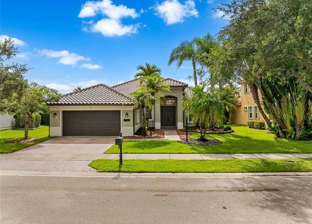Property at 7098 NW 111th Ter, Parkland, FL 33076, 4 beds, 3 baths