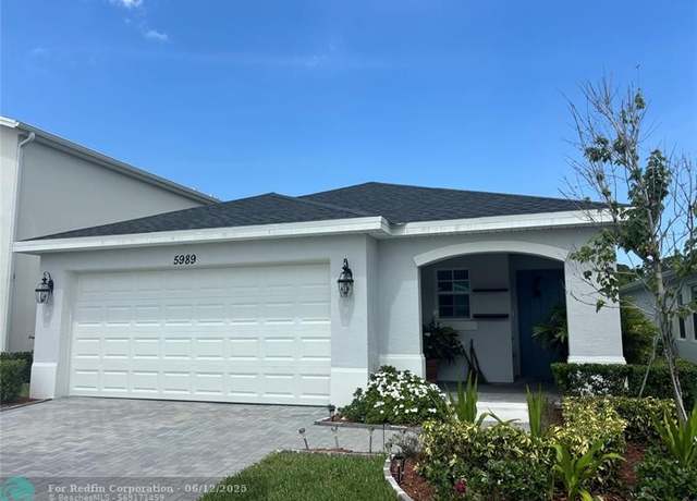 Property at 5989 NW Sweetwood Dr, Port St. Lucie, FL 34987, 3 beds, 2 baths