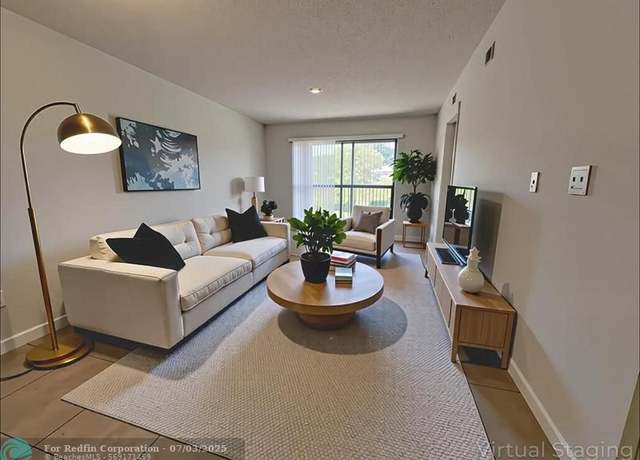 Property at 1650 SW 124th Ter Unit 209D, Pembroke Pines, FL 33027, 2 beds, 1.5 baths