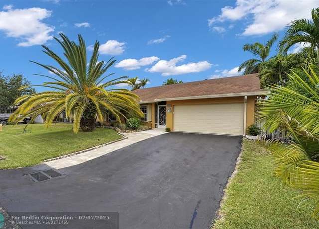Property at 9811 NW 53rd Ct, Coral Springs, FL 33076, 4 beds, 2 baths