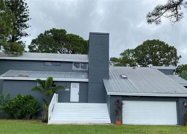 Property at 6945 150th Pl, Palm Beach Gardens, FL 33418, 4 beds, 3.5 baths
