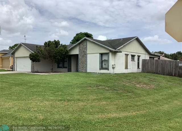 Property at 449 SW Aster Rd, Port St. Lucie, FL 34953, 3 beds, 2 baths