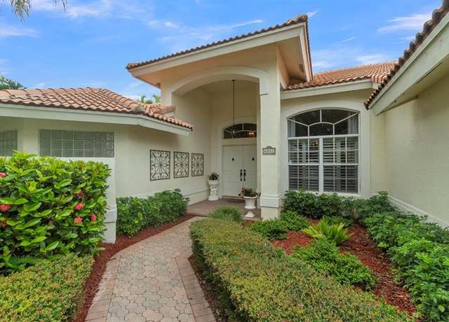 Property at 6041 NW 63rd Pl, Parkland, FL 33067, 5 beds, 3 baths