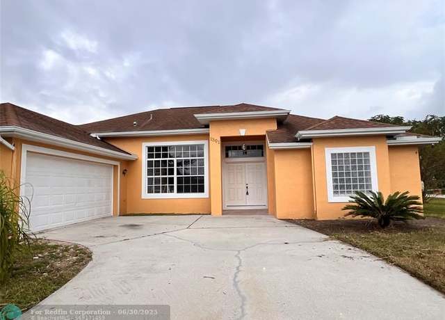 Property at 1301 SW Gahaf Ave, Port St. Lucie, FL 34953, 4 beds, 2 baths