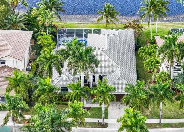 Property at 884 Marina Dr, Weston, FL 33327, 5 beds, 3 baths
