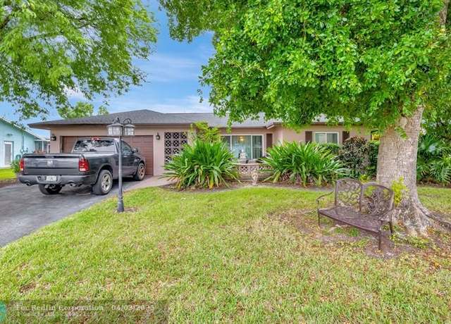 Property at 8010 NW 103rd Ave, Tamarac, FL 33321, 3 beds, 2 baths