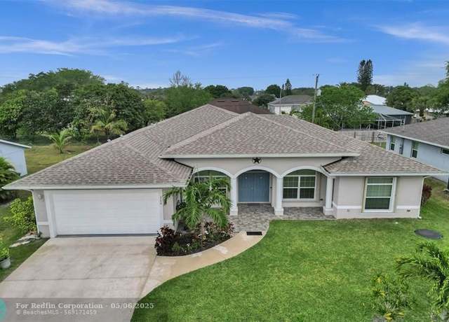 Property at 126 NW Heather St, Port St. Lucie, FL 34983, 4 beds, 2.5 baths
