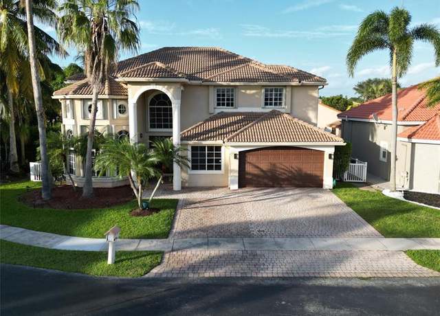 Property at 12365 NW 26th St, Coral Springs, FL 33065, 4 beds, 3 baths
