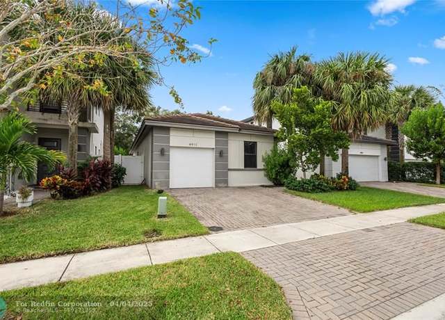 Property at 4911 Whispering Way, Dania, FL 33312, 3 beds, 2.5 baths