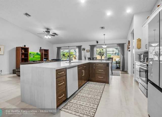 Property at 9925 NW 52nd St, Coral Springs, FL 33076, 4 beds, 2 baths