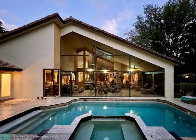 Property at 6901 NW 61st Ave, Parkland, FL 33067, 4 beds, 4 baths