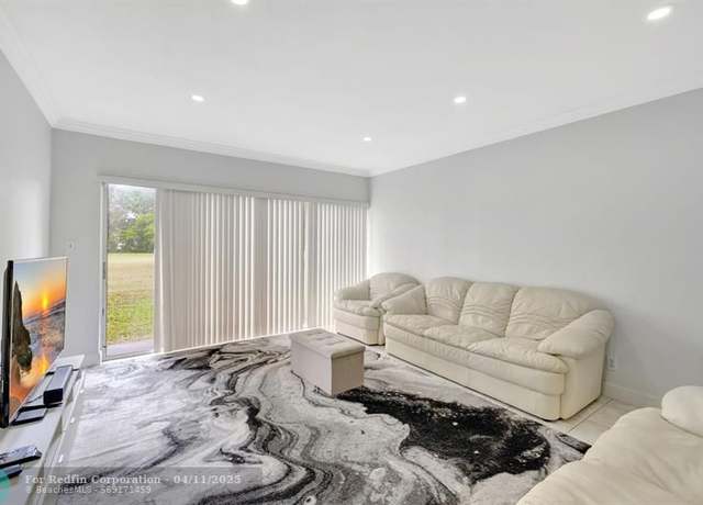 Property at 9933 NW 65th Ct Unit D15, Tamarac, FL 33321, 2 beds, 1.5 baths