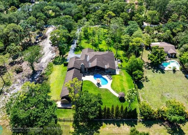 Property at 5840 NW 66th Ave, Parkland, FL 33067, 5 beds, 3.5 baths