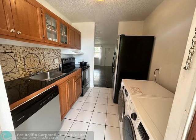 Property at 850 E Commercial Blvd Unit 225C, Oakland Park, FL 33334, 2 beds, 1 bath